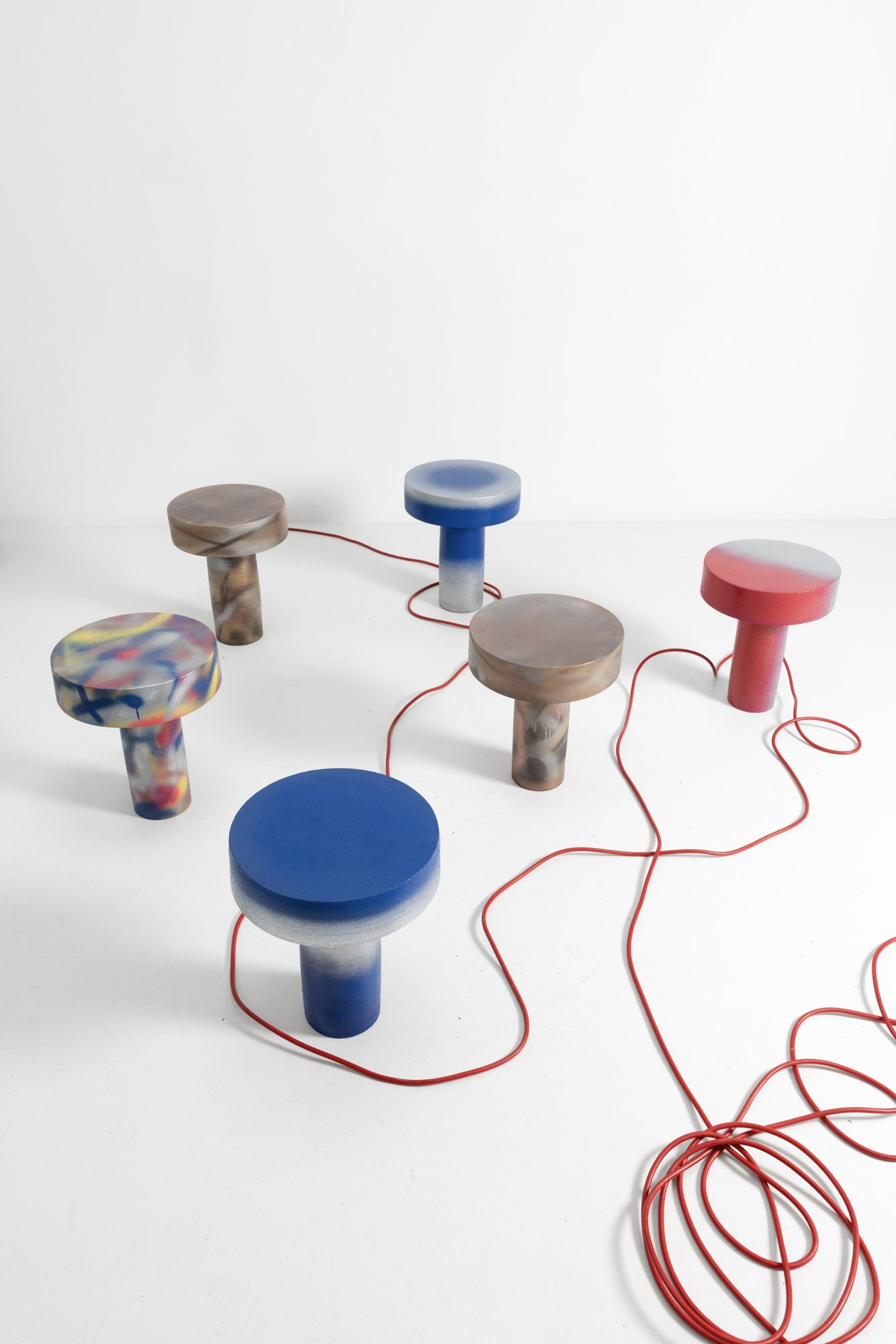 Craig’s coloured ceramic lamps with a red cable
